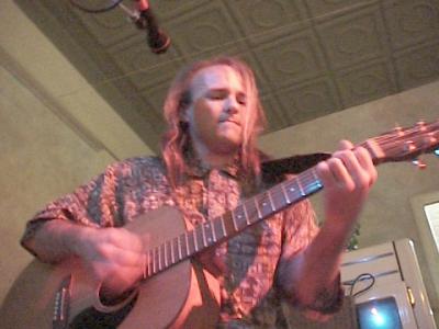 Me, performing at an open mic night.